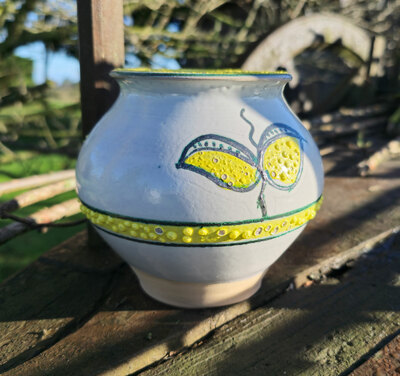 Bote de la grasa hojas verde y amarillo de Faro