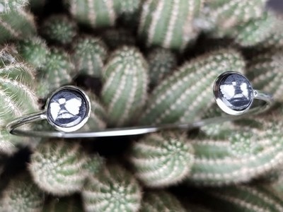 Pulsera acero rígido con dos piedras de quiastolita 1